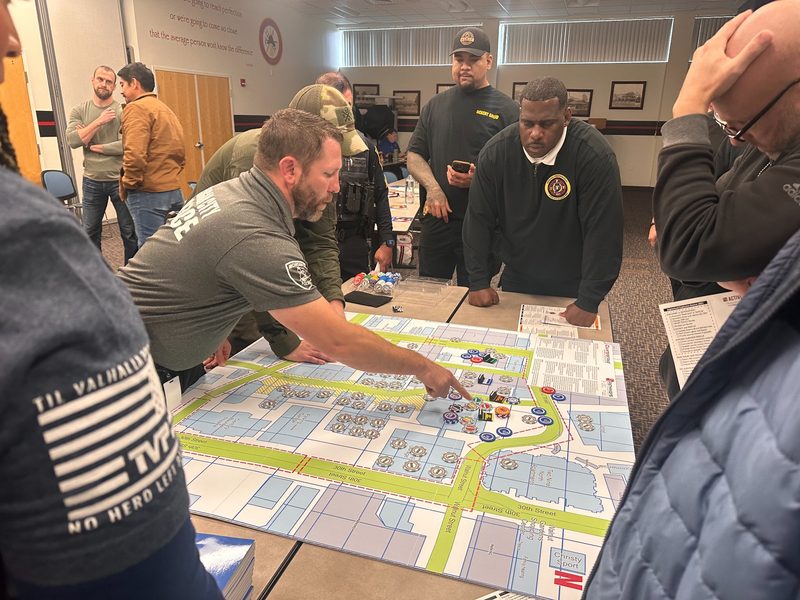 ASIM Basic Train-the-Trainer participants working through a tabletop map exercise.